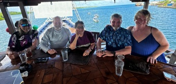 Group at bar on top deck